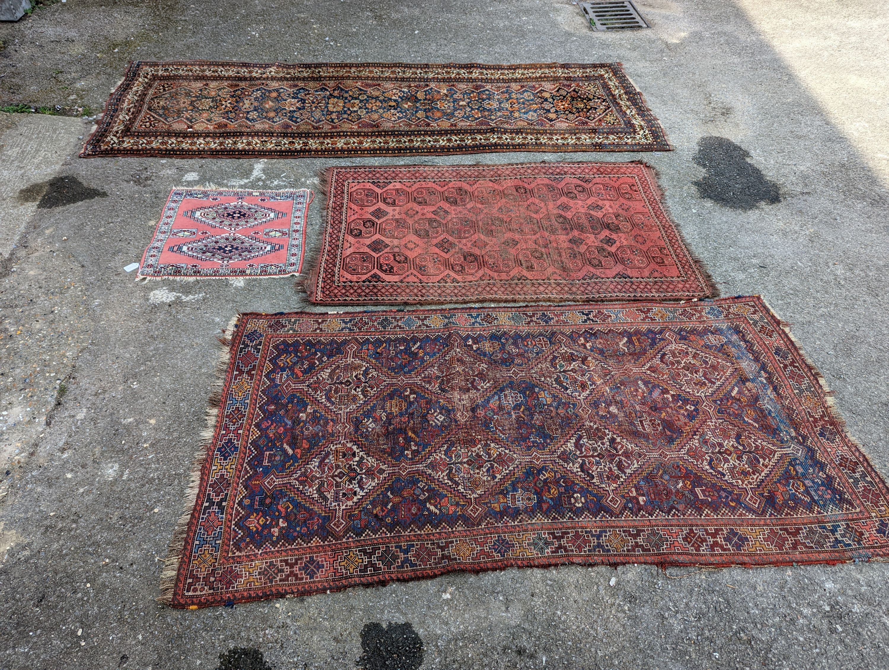 A North West Persian blue ground runner, 300 x 109 (worn and holed) a North West Persian rug, Bohara rug and mat